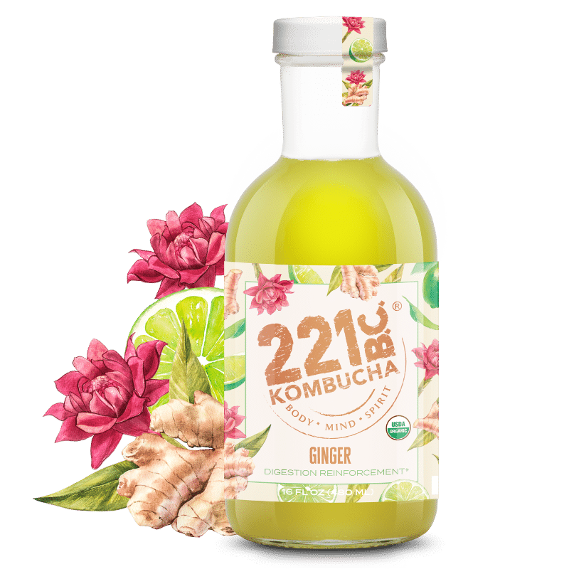 ginger kombucha flavor in bottle surrounded by lime rose and ginger root