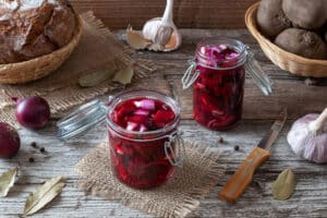 fermented beets in mason jars on table