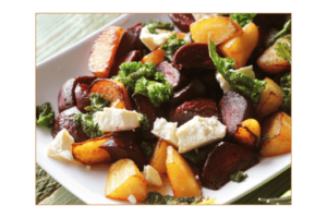 roasted fall harvest food and kale salad in bowl