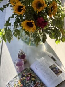 sunflower with book and kombucha