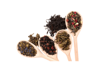 different loose leaf teas on wooden spoons