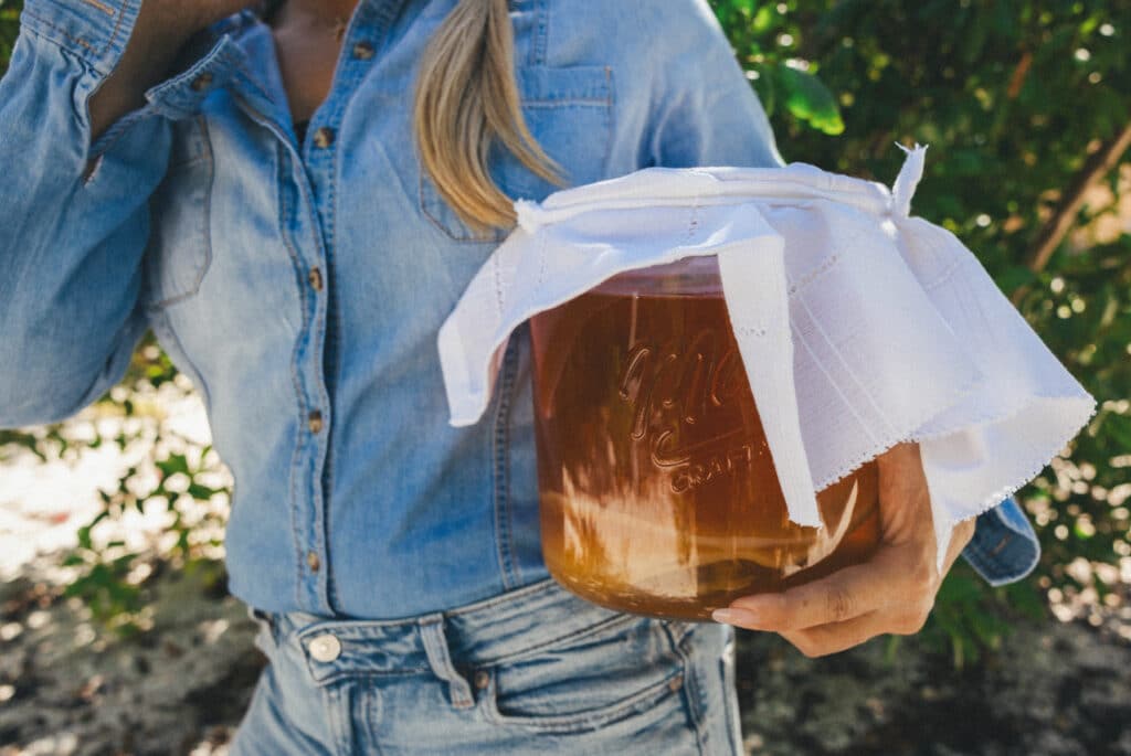 Aneta holding a jar of SCOBE